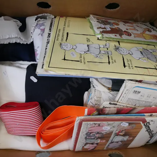 box; sewing patterns, fabric pieces