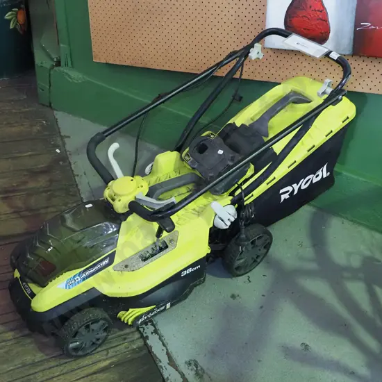 Ryobi battery powered lawn mower - battery in office