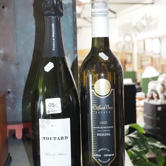 bottle of Clifford Bay 2003 reisling, bottle of French moutard champagne