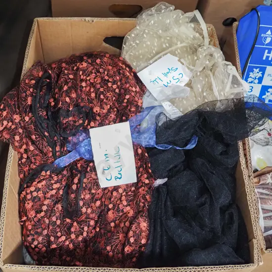 box; lengths of tulle fabric