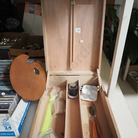 artist's storage box and easel
