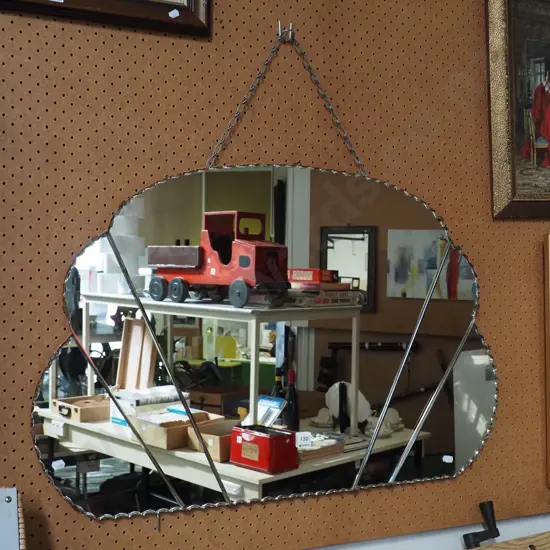 large scalloped edge deco wall mirror