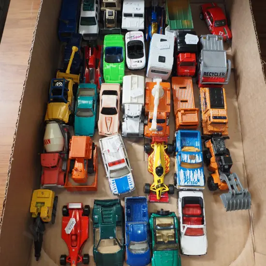 box of toy vehicles