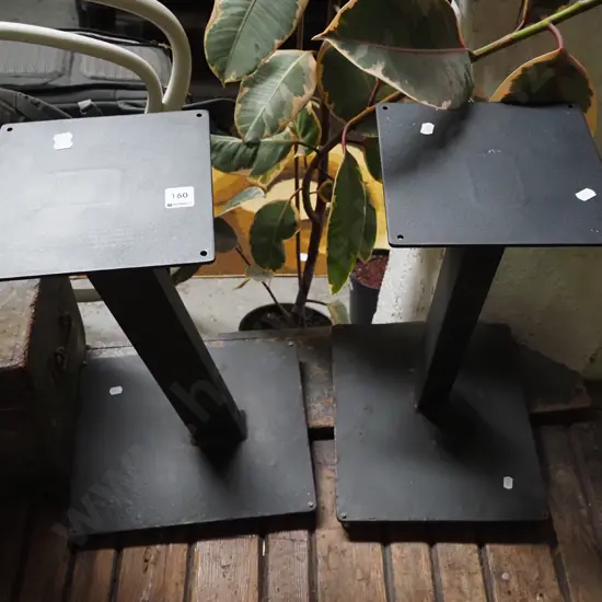 2x black metal speaker stands