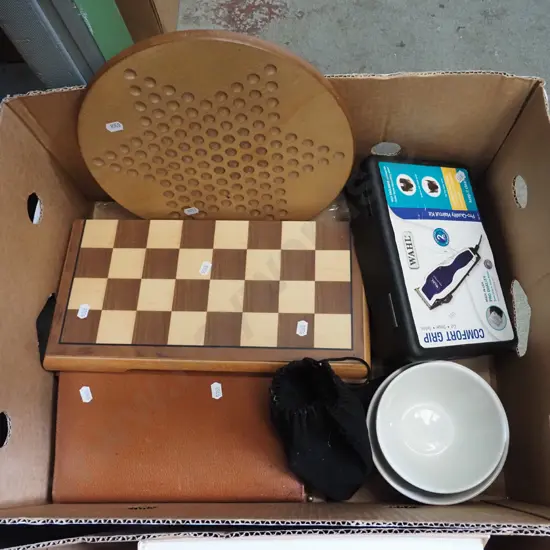 box; Wahl electric hair clippers, chess set, bowls, Chinese checkers etc
