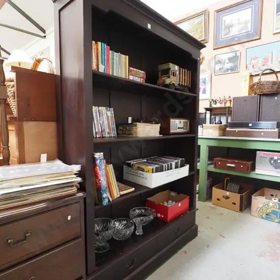 dark stained wooden bookcase with 2 drawers in base