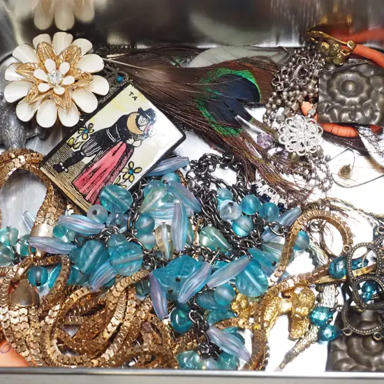 tin of costume jewellery