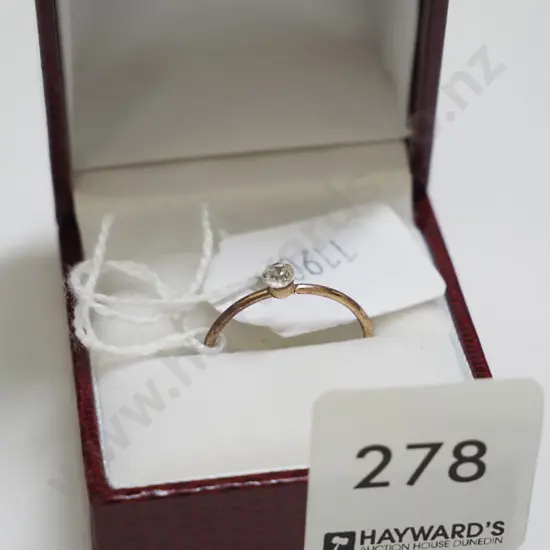 golden ring with stone