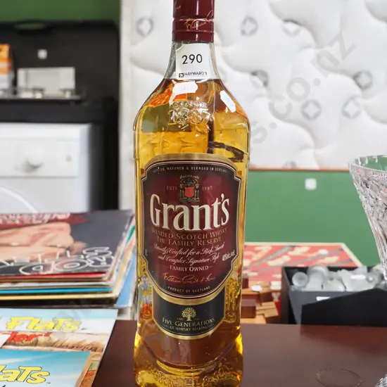 bottle of Grants 1L Scotch whisky