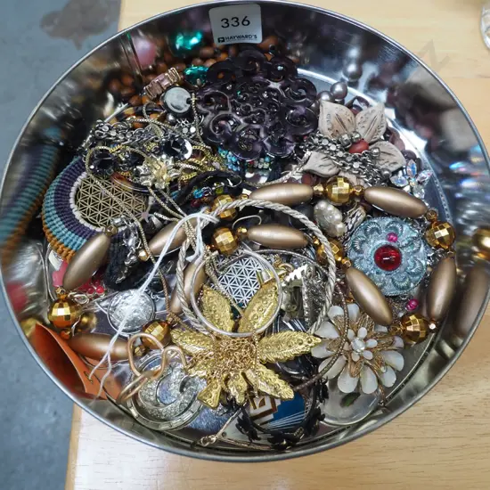 tin of costume jewellery