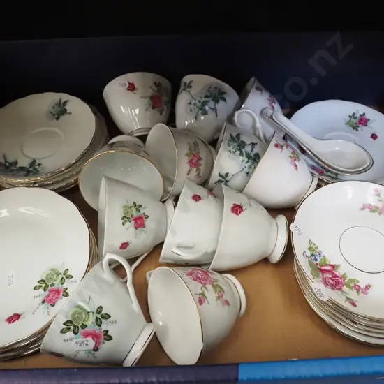 box of cups and saucers