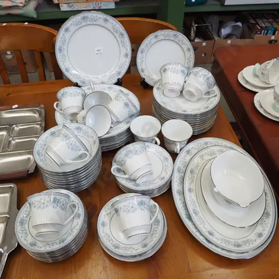large assortment of Noritake Blue Hill dinner items