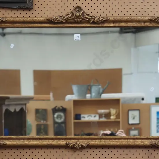 large gilt framed wall mirror