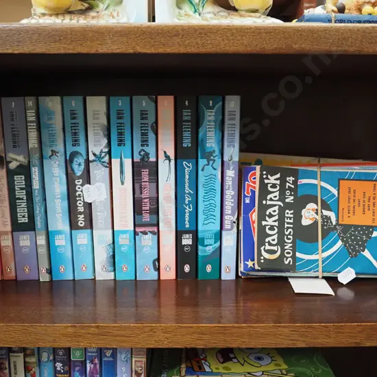 back issues of Crackerjack song birds and Ian Fleming books