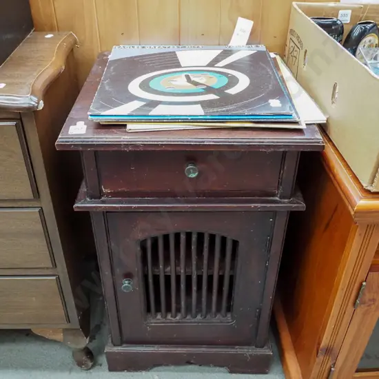 small bedside cabinet with unusual dowel panelled door