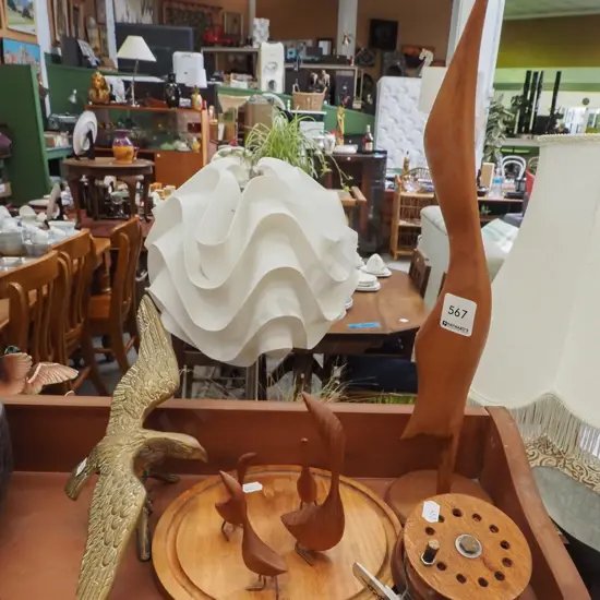 wooden bird figurines, homemade fly fishing reel, small brass eagles