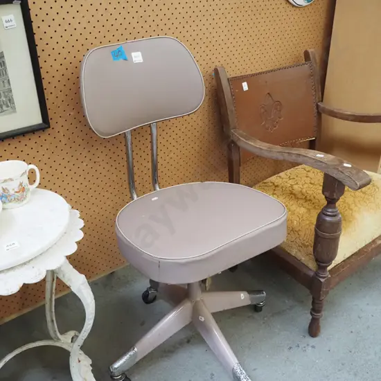 early chrome and vinyl upholstered office chair