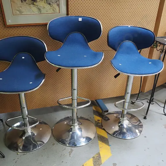 3x blue upholstered and chrome bar stools