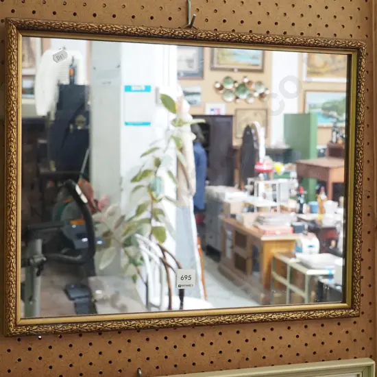 gilt framed wall mirror