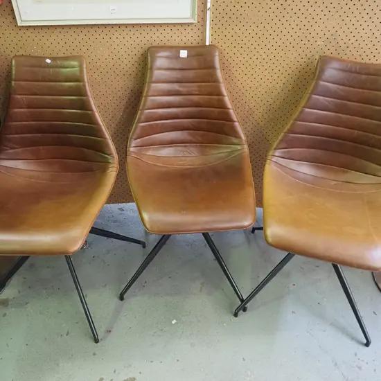3x brown leather swivel chairs