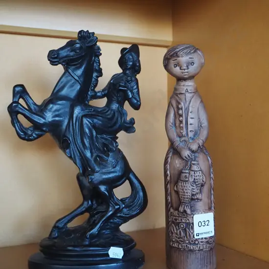 pottery figurine, female on rearing horse H-70