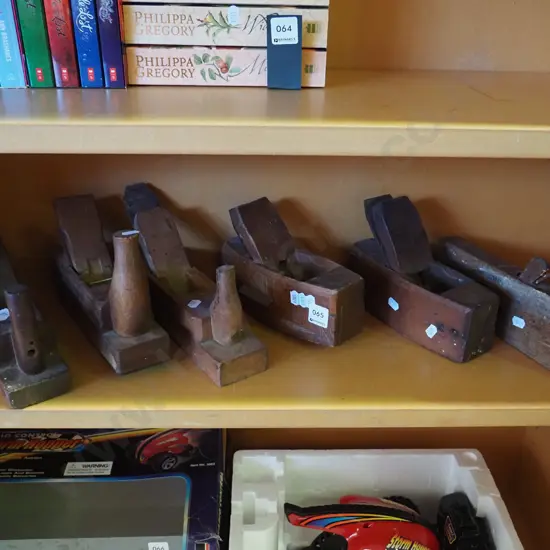 shelf of wooden hand planes