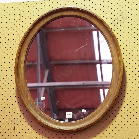 oak framed oval wall mirror