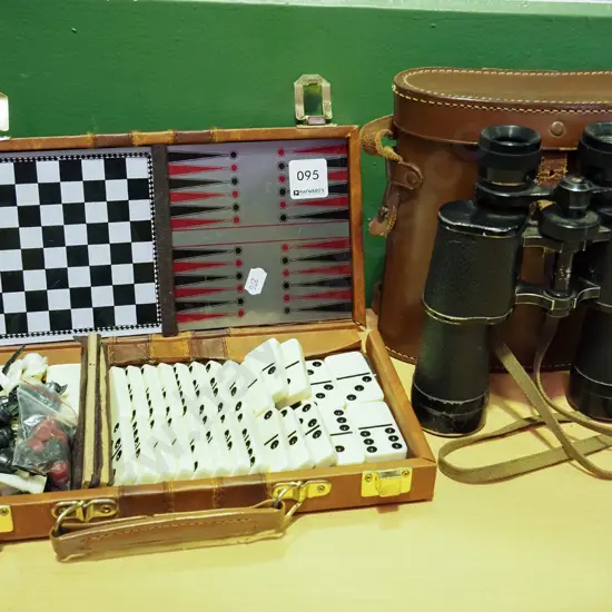 games compendium, pair of leather cased binoculars