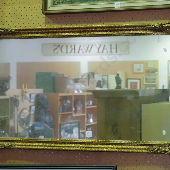 gilt framed wall mirror