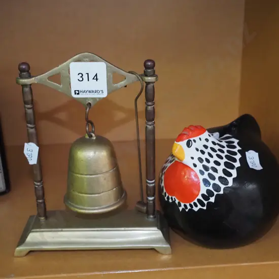 brass bell on stand, happy hen