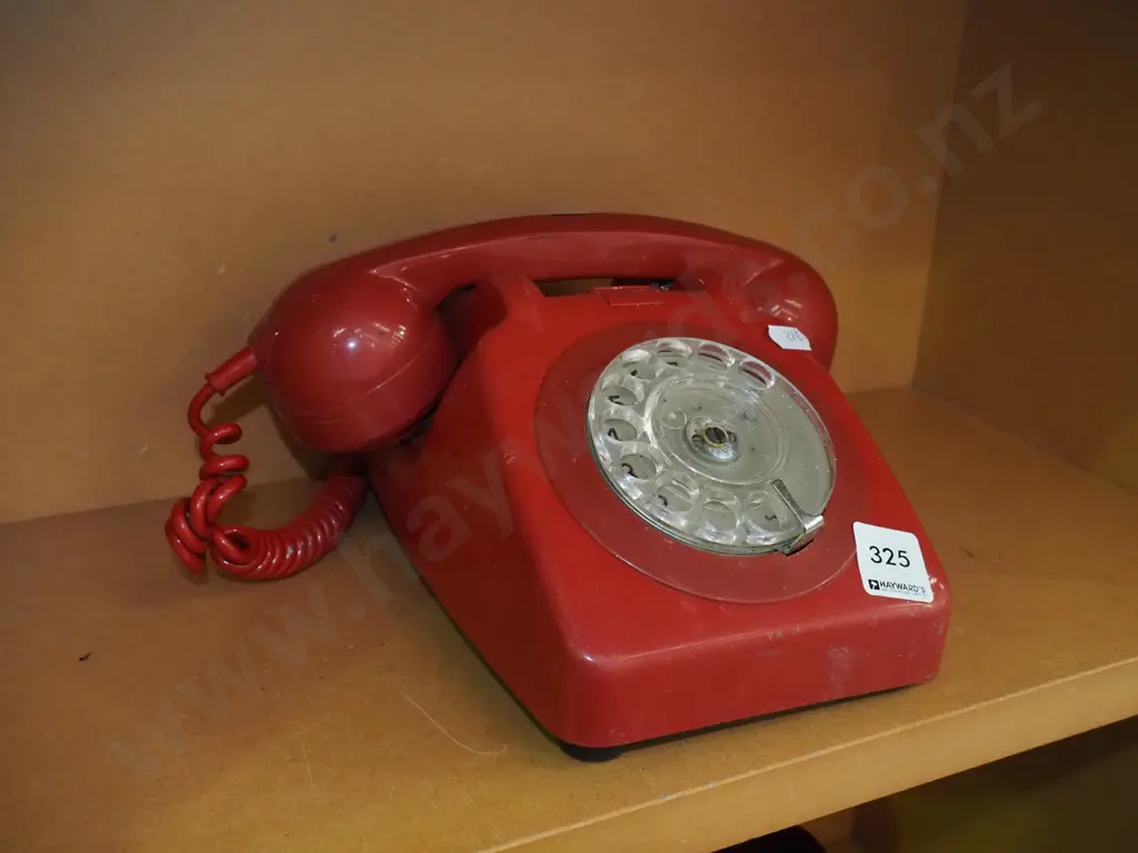red plastic dial telephone Image 1++