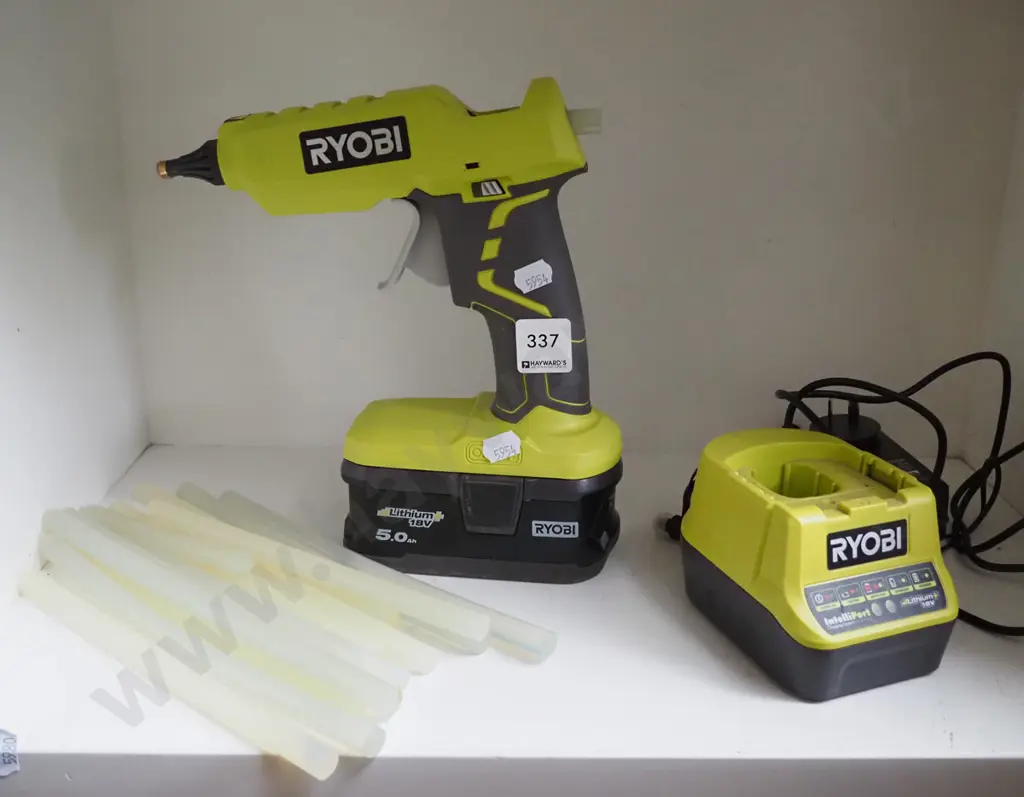 Ryobi battery powered glue  gun - battery in office Image 1++
