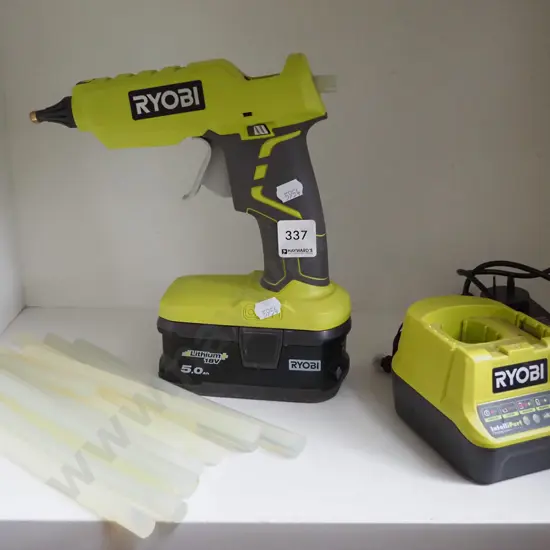 Ryobi battery powered glue  gun - battery in office