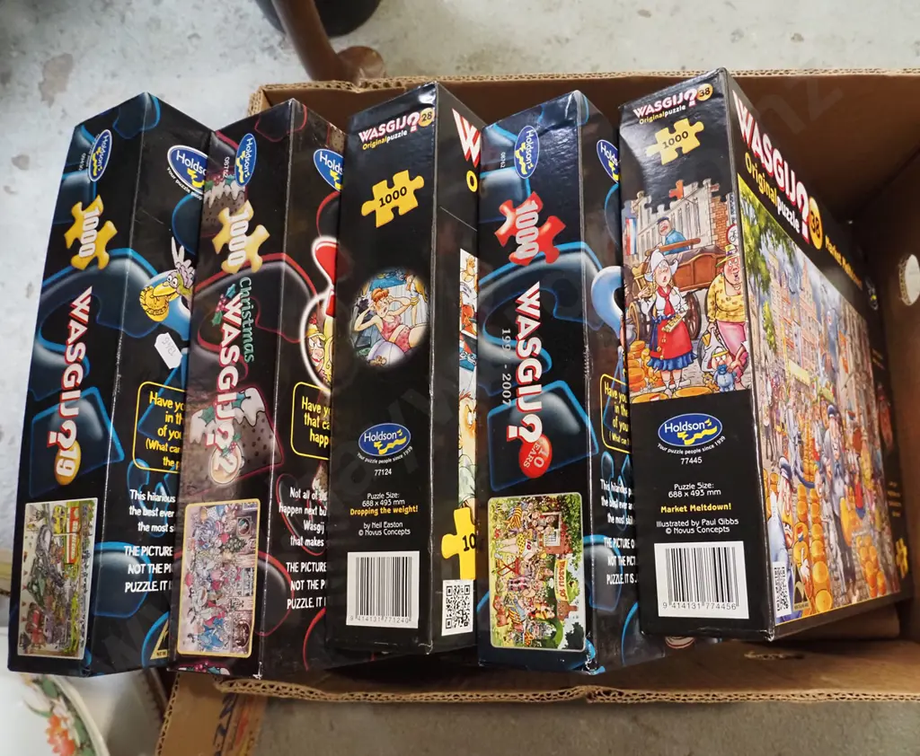box of wasgij puzzles Image 1++