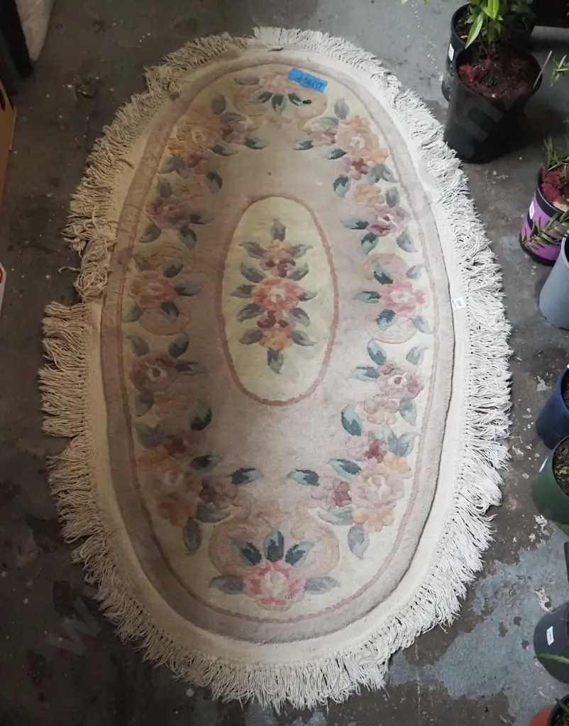 oval tasselled floral floor mat L-1500 W-720 Image 1++