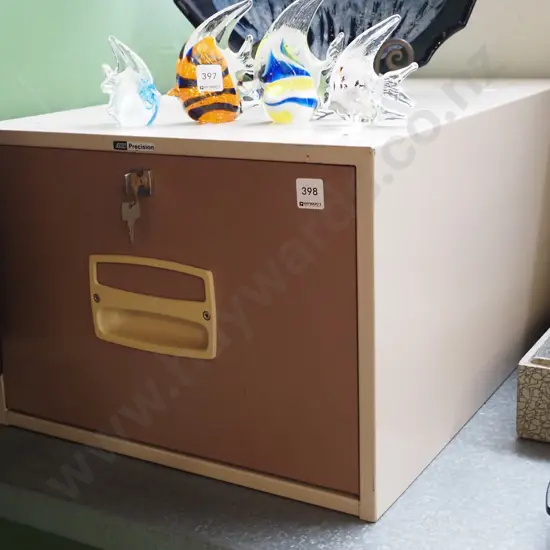 lockable single drawer filing cabinet - key in office