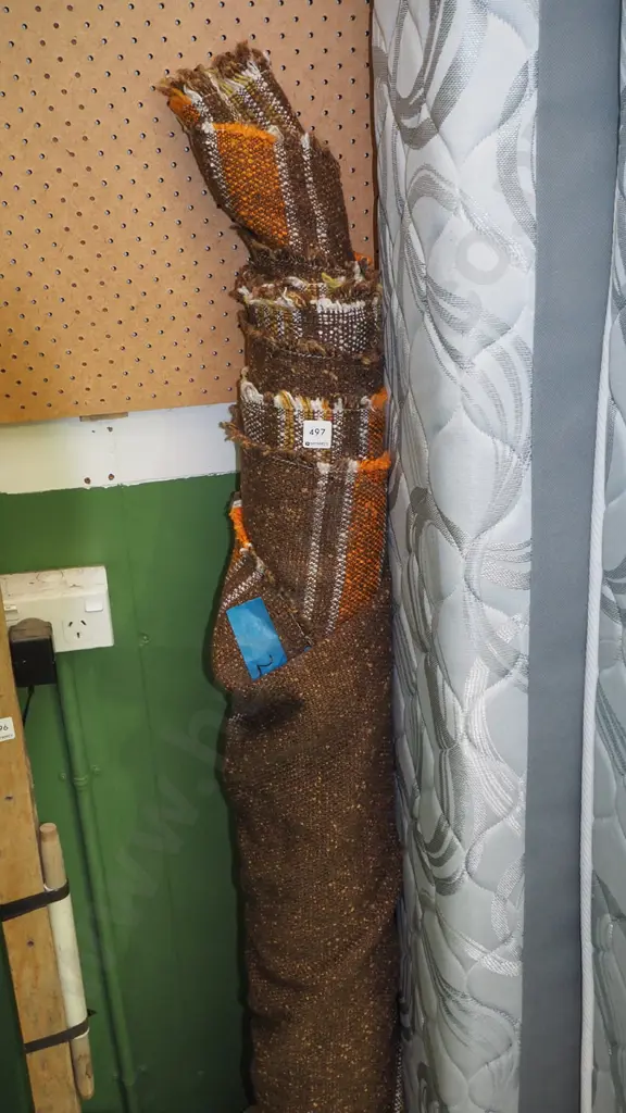 bolt of multi coloured loose woven woollen fabric Image 1++