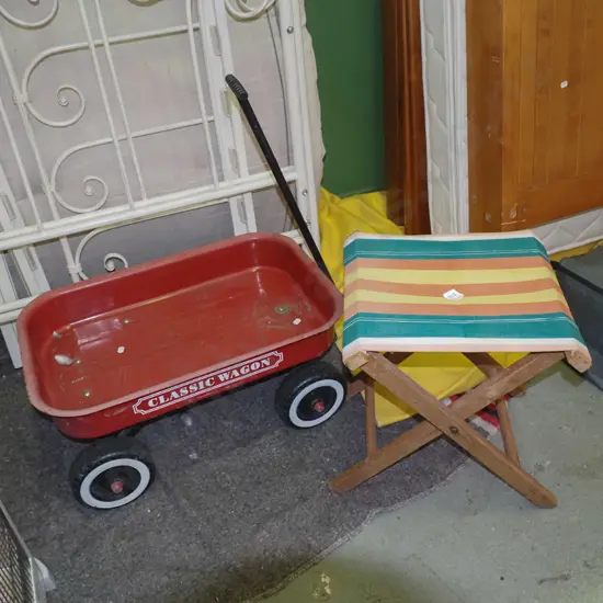 red metal child's classic wagon, striped canvas foldaway stool