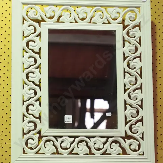 pierced wood framed wall mirror