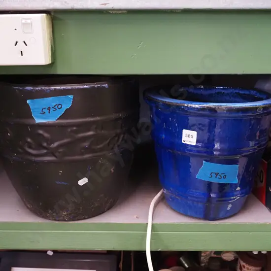 blue glazed and black painted planters