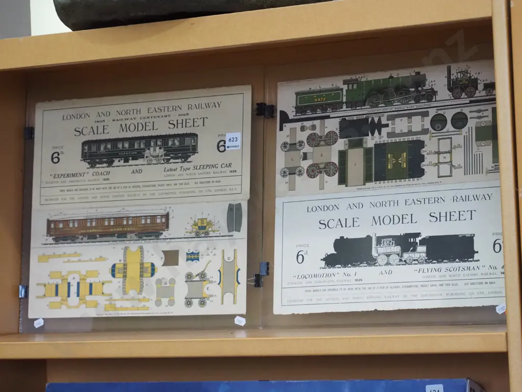 2x train paper cut outs under glass Image 1++