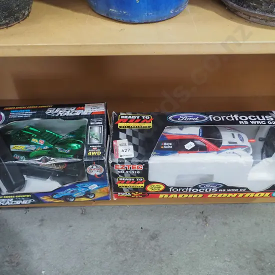 2x boxed remote control cars