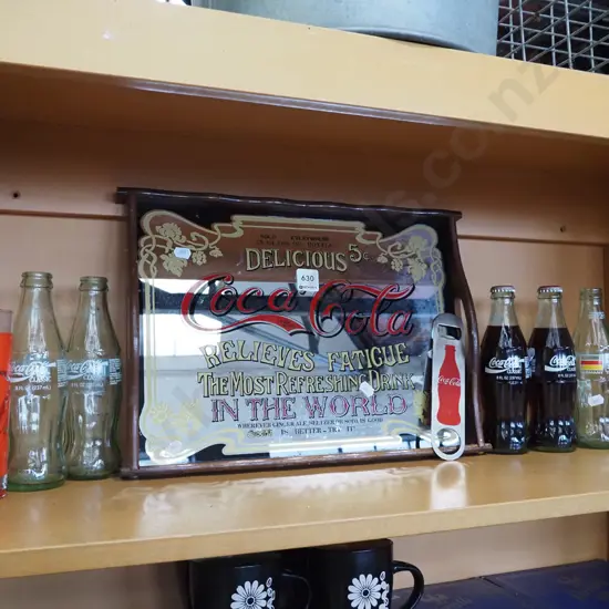 Coca Cola bottles, mirrored advertising tray