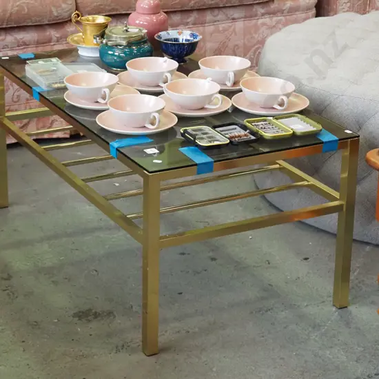 brass and smoked glass coffee table