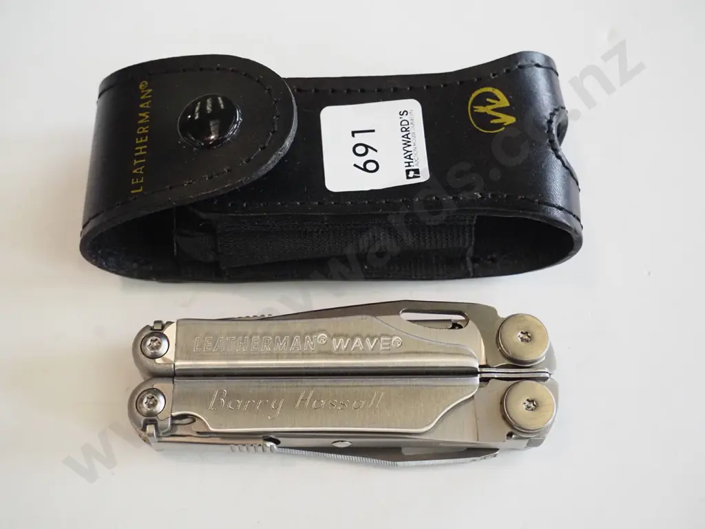 multi tool in pouch Image 1++