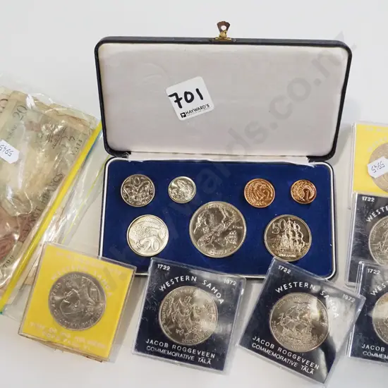 assorted coins and bank notes