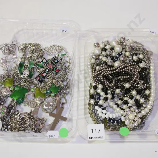 2x plastic trays of costume jewellery - green dots