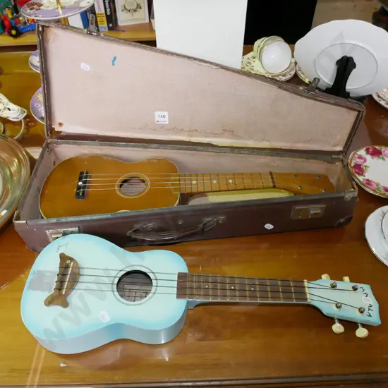 2x ukeleles - 1 has case