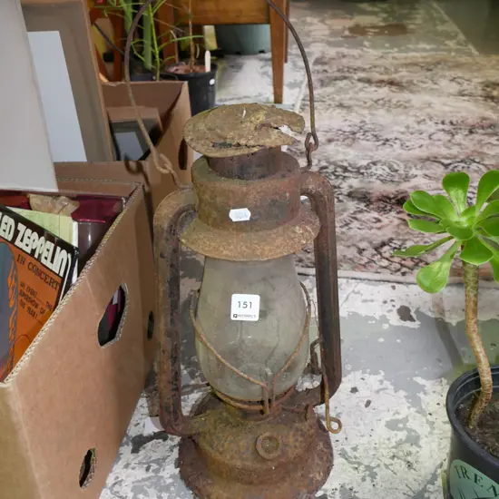 rusty hurricane lantern 