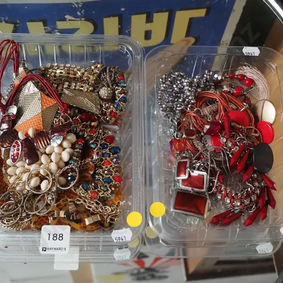 2x plastic trays of costume jewellery - green dots